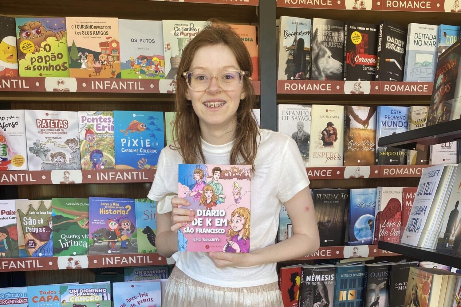 Young author Ema Rawcliffe|Ema at her first book signing session at Lisbon's recent Book Fair|Ema hopes to inspire other young writers|Ema Rawcliffe author