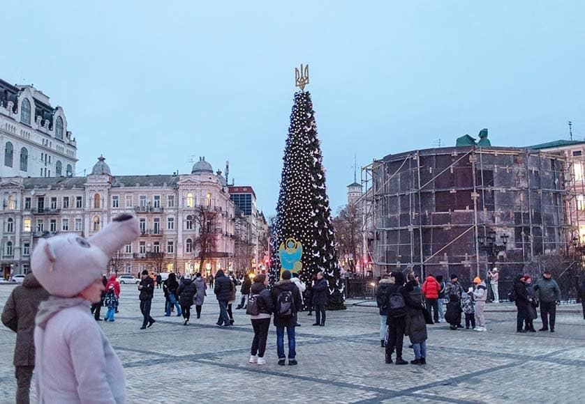 People gather next to a Christmas tree installed at Sophia Square, in Kyiv, Ukraine, on December 20, 2022, amid the Russian military invasion|Family-type orphanages|Hospital in Izium|Humanitarian aid from the Foundation