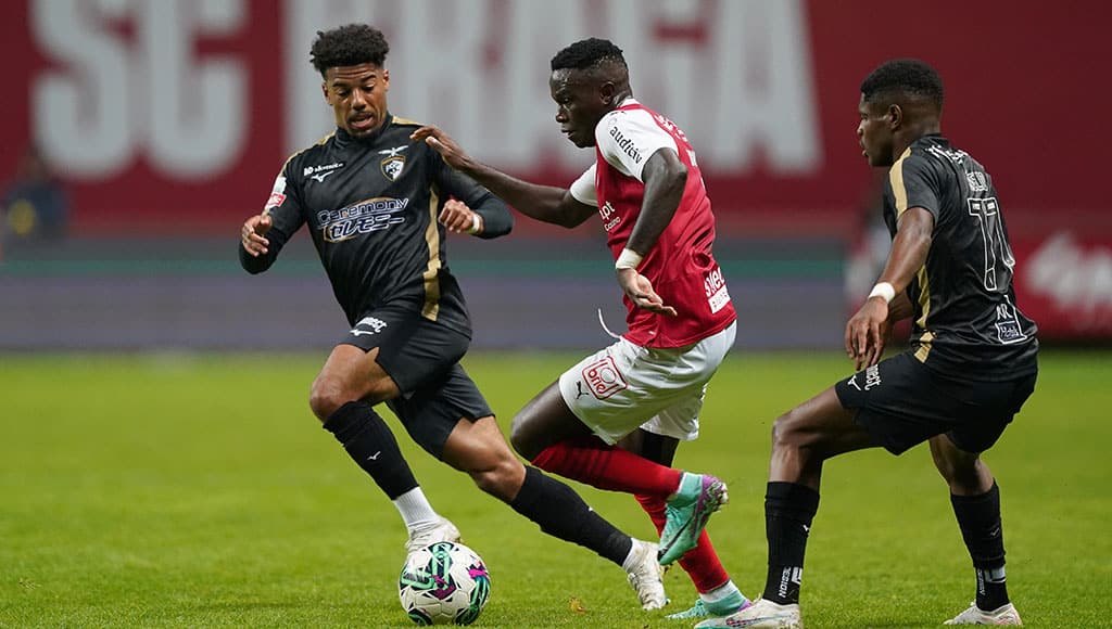 Braga player Bruma (centre) fights for the ball against Portimonense players Jasper and Varela, at a match on November 4 at Braga Municipal Stadium