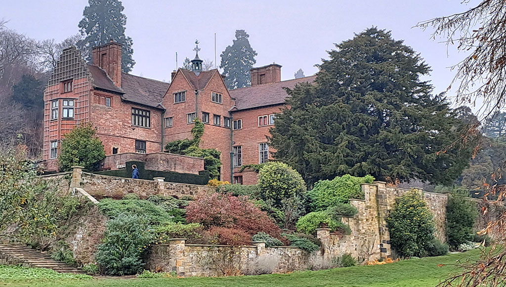 The rear of the Chartwell Property from the garden|Dolls for Christmas in Lady Churchill's Sitting Room|An array of Churchill's walking sticks in the Hall|The Secretaries' Office, the hub of the whole place|The beautifully decorated Drawing Room|The windows from the elegant Dining Room had a superb view of the gardens|The kitchen boasted a very large Aga Cooker|Churchill's Artist's Studio contains many of his paintings|Churchill liked to sit overlooking the Orfe Pond|The Swimming Pool was just one of the ponds and lakes he constructed at Chartwell