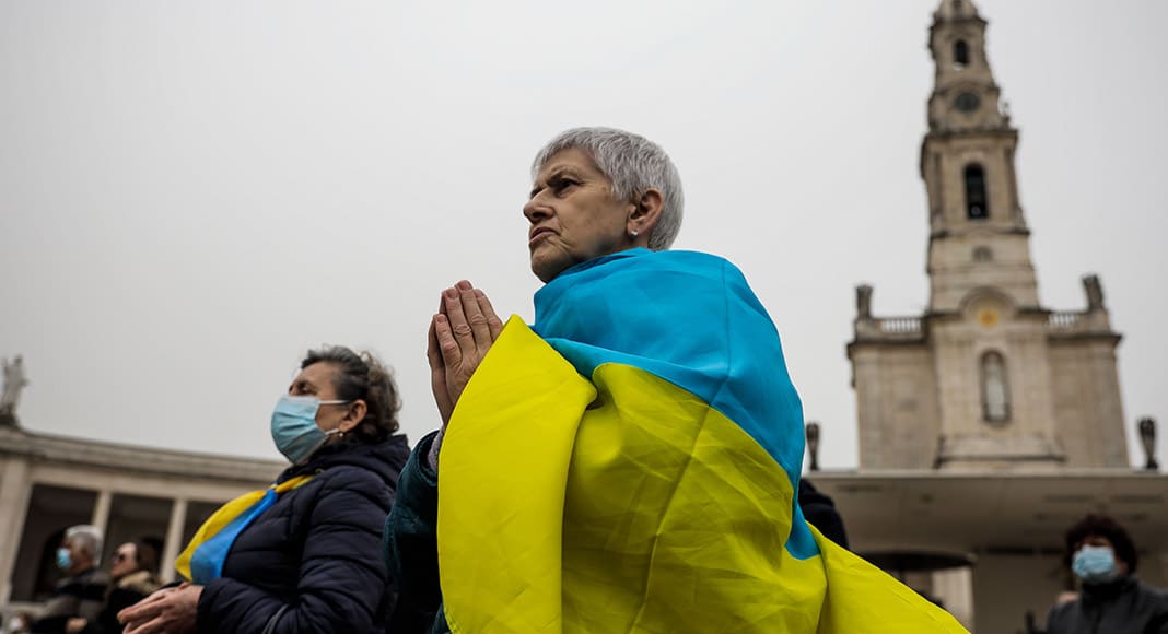 Women pray during the Act of Consecration of Russia and Ukraine to the Immaculate Heart of Mary, at Fátima Sanctuary on March 25