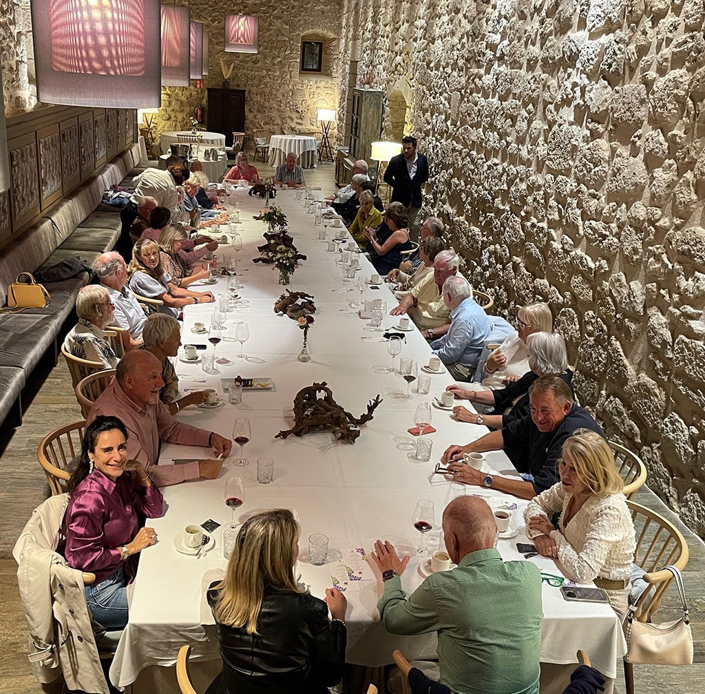 Dining banquet style at Hotel Castilla Termal Monasterio in Valbuena|Nicola Thornton with Sergio Gonzalez of Cepa 21|Underground cellars at Valreinas|Value for money from small producer wines|Peñafiel from the castle shaped like a ship|The huge investment in oak barrels to produce top reds
