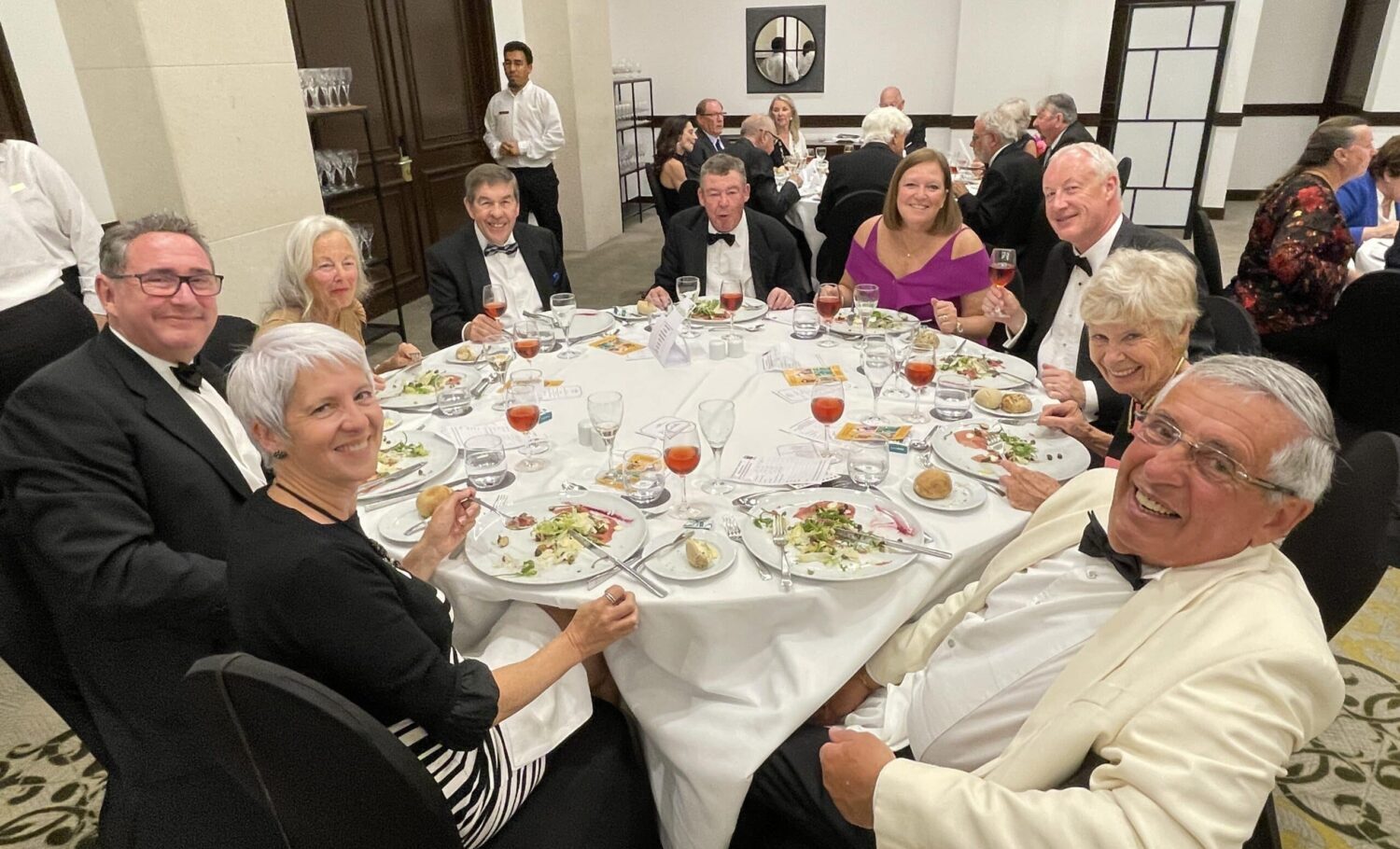 Happy diners at the Sheraton Pine Cliffs|Vanessa and José Perdigão, flanked by Steve Rigby and Nick Sykes of the AWS|AWS Secretary Nigel Adams and friends enjoy Perdigão Rosé|Wild Guitars performed some golden hits|6 Label designed by Vanessa