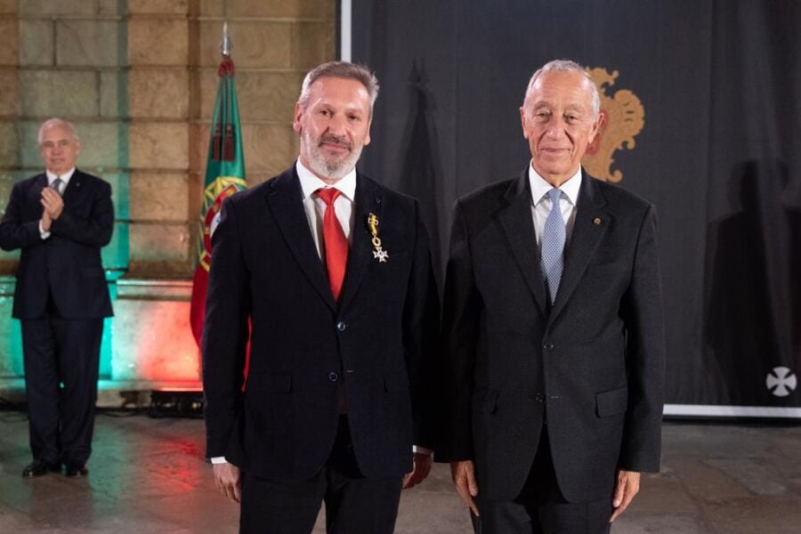 Adriano Correio Cardoso proudly receiving his award last month in the presence of President Marcelo