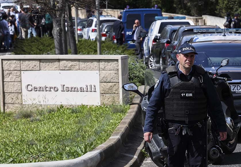 Police officers guard at the Ismaili Center in Lisbon, Portugal, 28 March 2023. Two people were killed at the center earlier the day in an assault with a melee weapon, police said. EPA/ANTONIO COTRIM