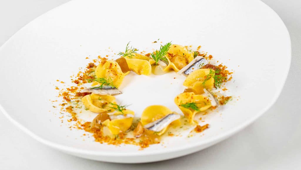 Tortellini filled with marinated anchovies, fennel and lemon gel