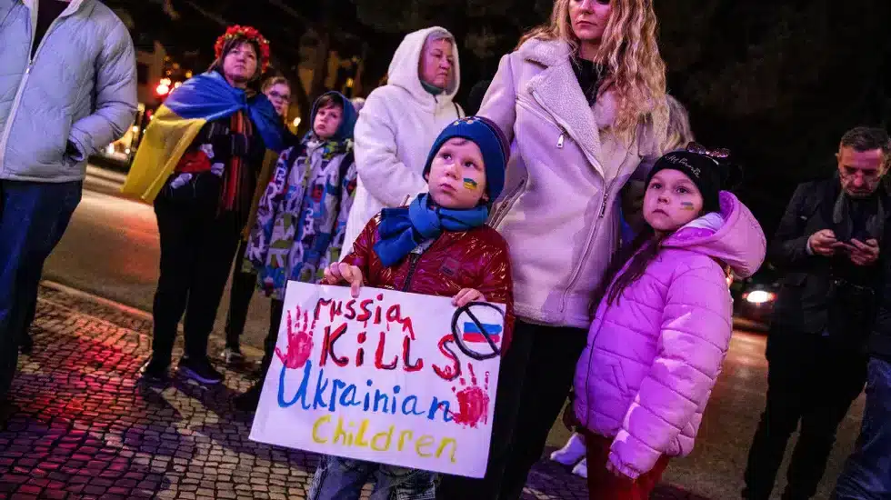 Children holding Ukraine sign