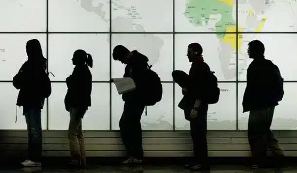 people in line|UK and EU flag