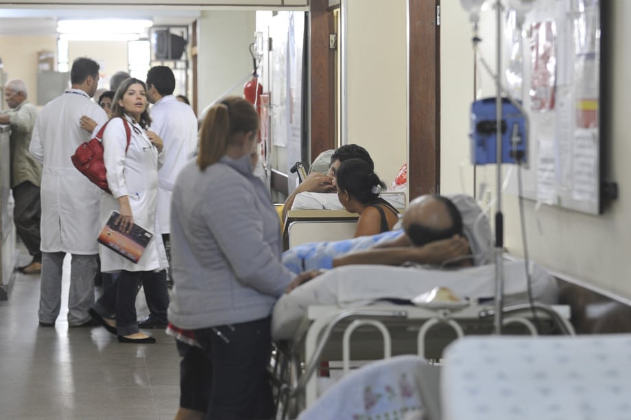 An archive image, again exemplifying the chaotic nature of winter season demands on hospitals, which invariably see patients stacked up in corridors on makeshift beds