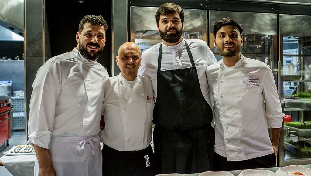 Chef Heinz Beck sharing the kitchen with Francesco Nunziata, chef at the Tuscan Castello di Fighine 1*, Salvatore Iuliano from the iconic St George by Heinz Beck 2* in Sicily, and Liborio Buonocore, executive chef at Gusto by Heinz Beck 1* in the Algarve.|Tortellini filled with marinated anchovies, fennel and lemon gel|Red Mullet with artichokes, salted lemon and olive crumble|apple tarte tatin with croissant ice cream, mountain pine and caramel sauce|In the kitchen, Chef Heinz Beck and his three guest chefs prepped for a once-in-a-lifetime performance|All-Stars-163-scaled