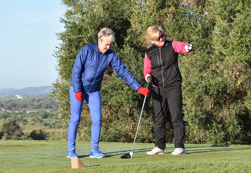 Guides are vital for golfers with a visual impairment (Carol Brill in the pink top)|Carol Brill|Carol Brill