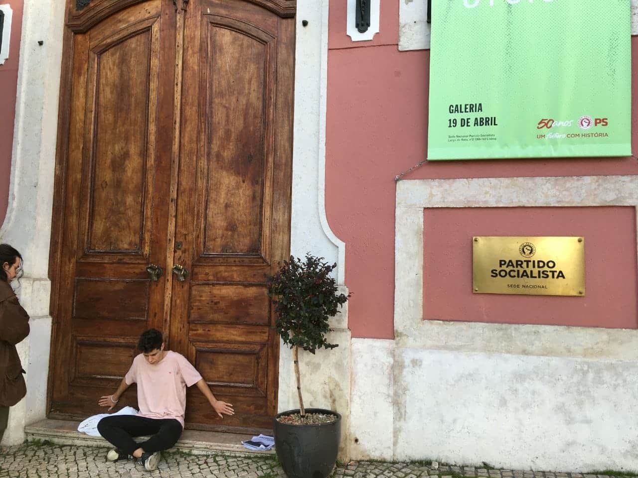 Climate activists glue themselves to entrances of political parties' HQs