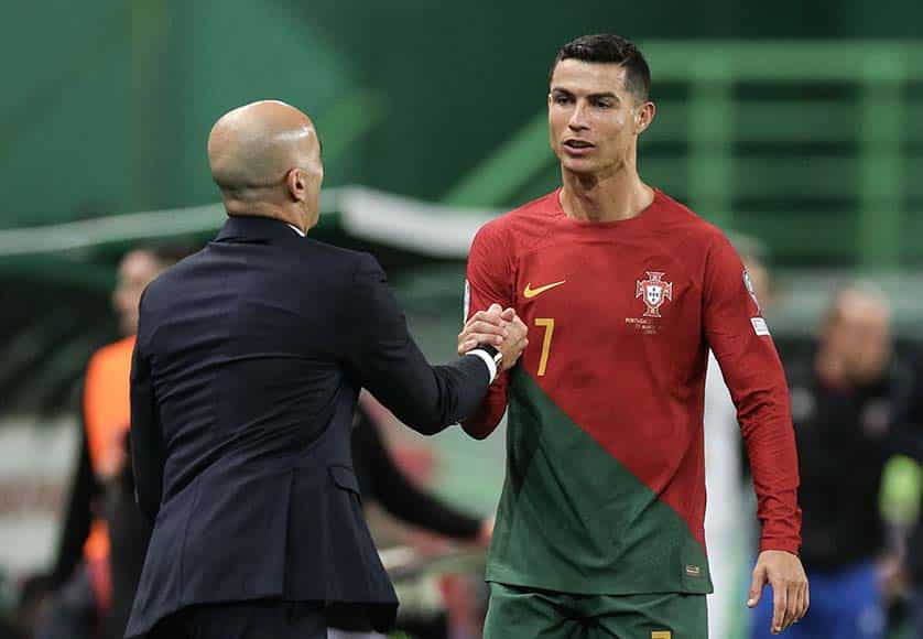 Portugal player Cristiano Ronaldo celebrates with the team head coach Roberto Martinez after scoring a goal against Liechtenstein during the Euro 2024 Group J qualifying football match at Alvalade Stadium, in Lisbon, Portugal, 23 March 2023. MIGUEL A. LOPES/LUSA