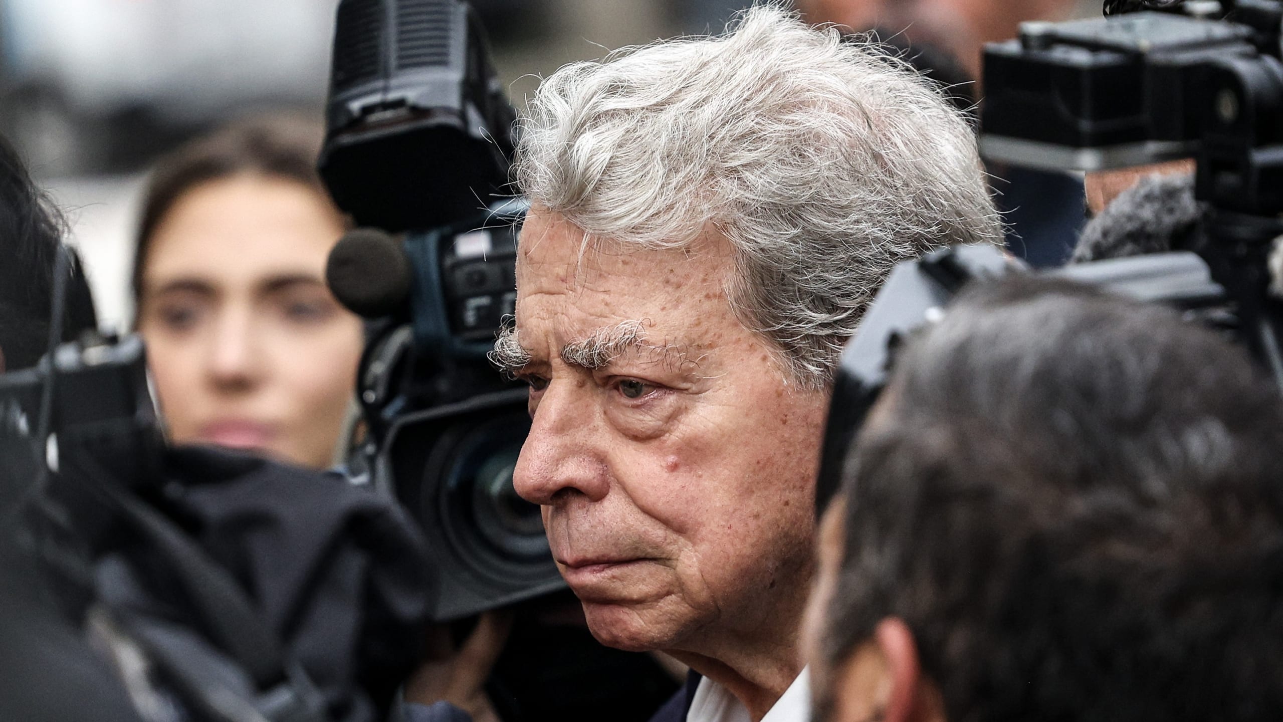 Ricardo Salgado being led by his wife into court today. Image: Andre Kosters/ Lusa|BES trial opens, showing agony 10 years on is every bit as raw