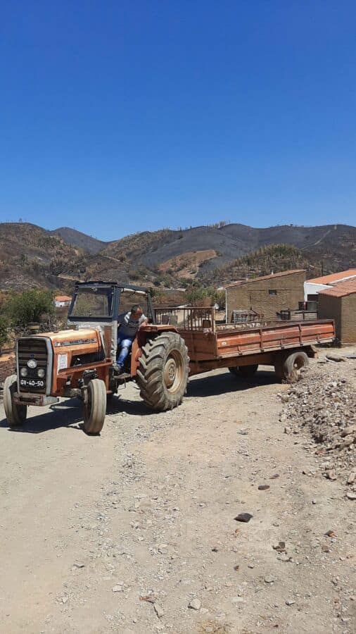 Community helps clear out debris from house destroyed by fire