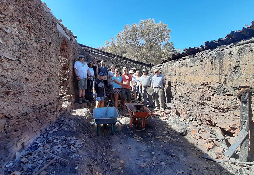 Community helps clear out debris from house destroyed by fire|Community helps clear out debris from house destroyed by fire|Community helps clear out debris from house destroyed by fire