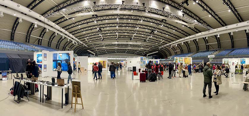 Duraes West stand pictured to the left|Paulo Canilhas work pictured to the left|Portuguese artist Stela Barreto (centre); background: Durães-West’s painting Blue #3, 180cmx200cmx4cm acrylic on canvas
