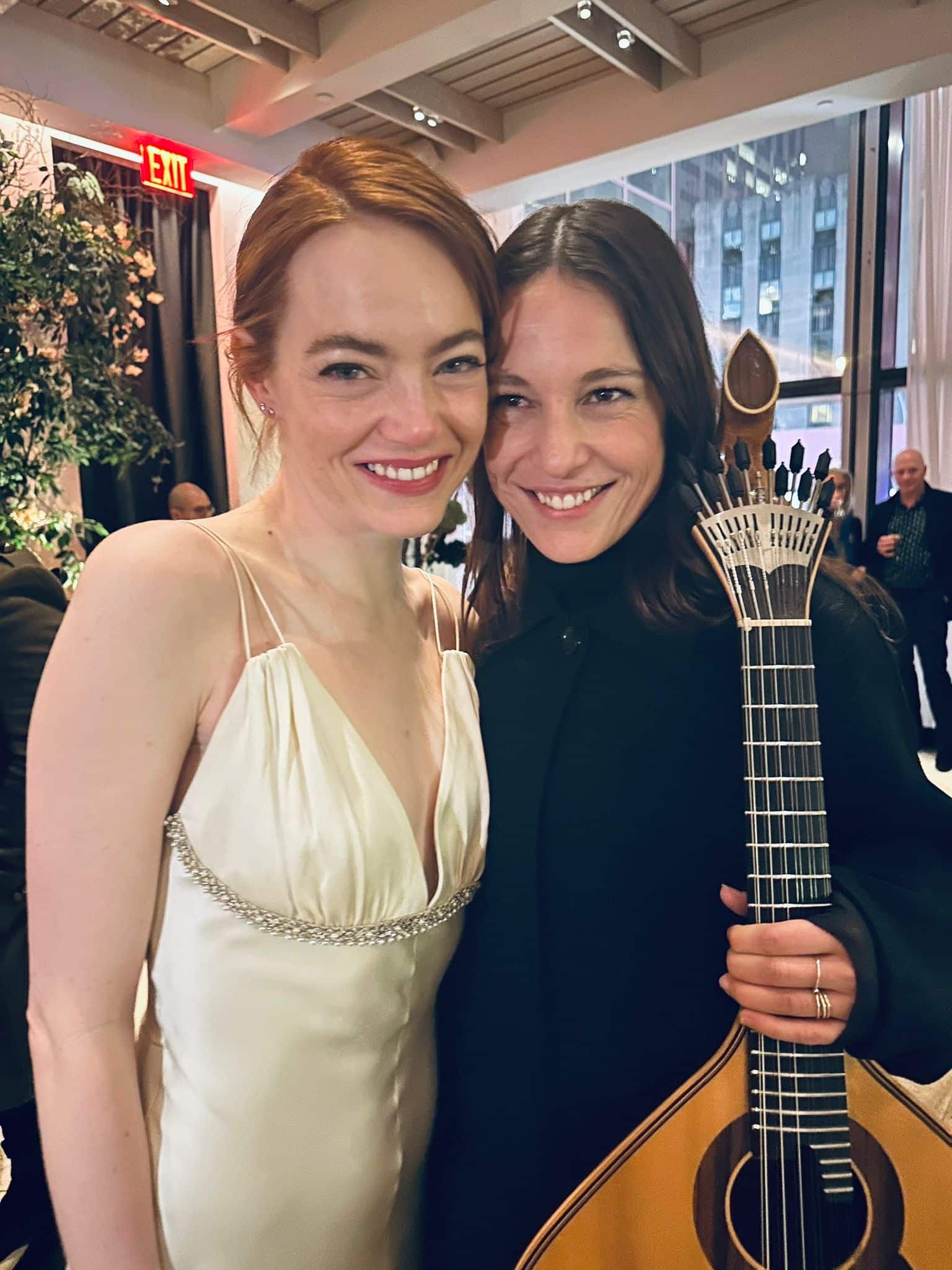 Emma Stone and Carminho.