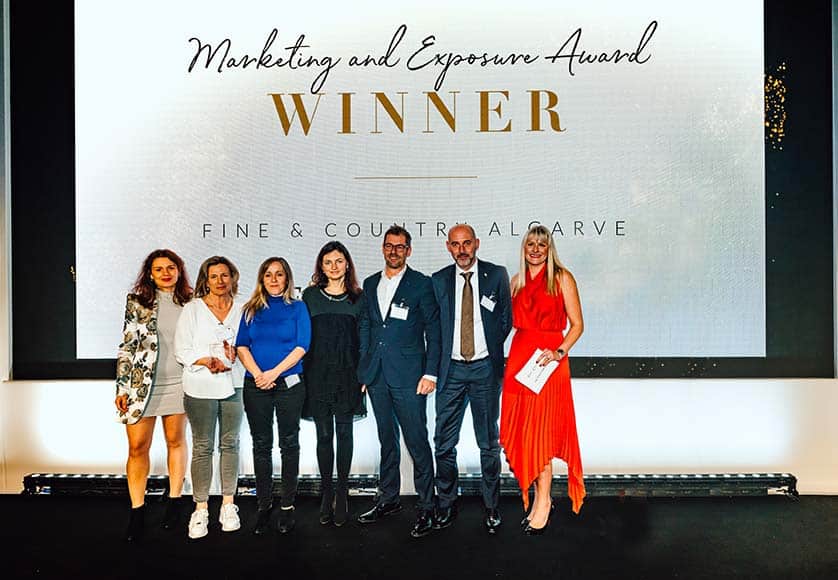 On stage at the award ceremony in London: members of the F&C Algarve team with Emilie Despois (far left), marketing director of Fine & Country, and Nicky Stevenson, managing director (far right)|F&C celebration