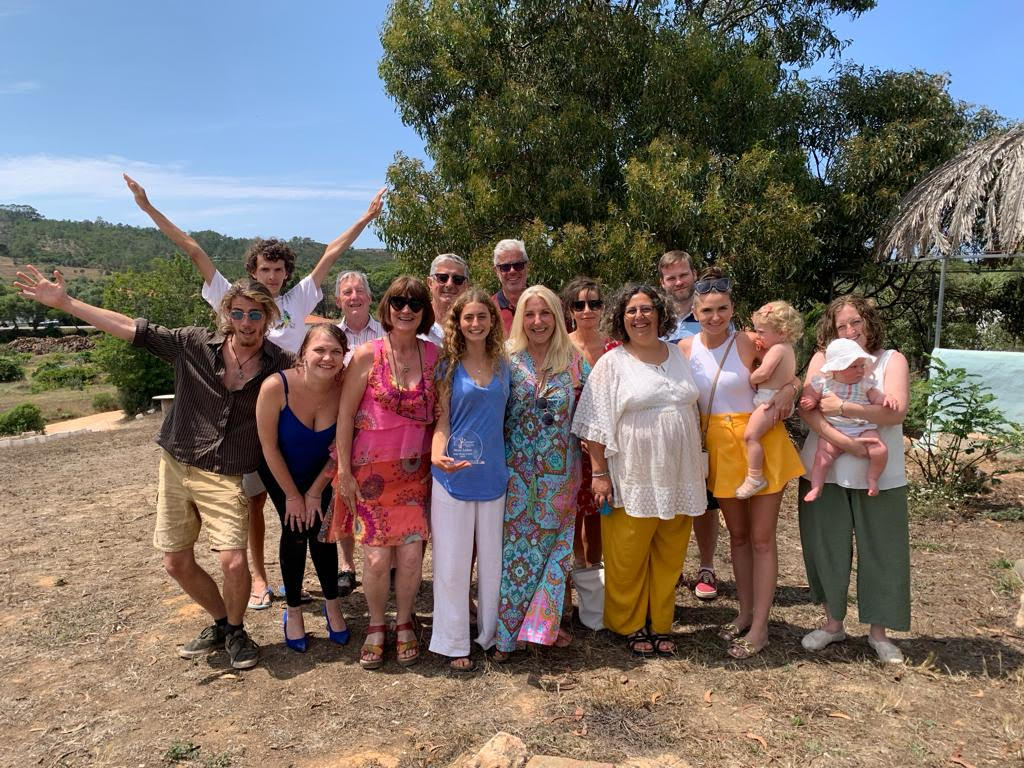 Year 12 student Noya Lahav (pictured centre in blue) at the ceremony|Photo of Tony at marina - Tony Wood Award presented to Aljezur school student Noya Lahav