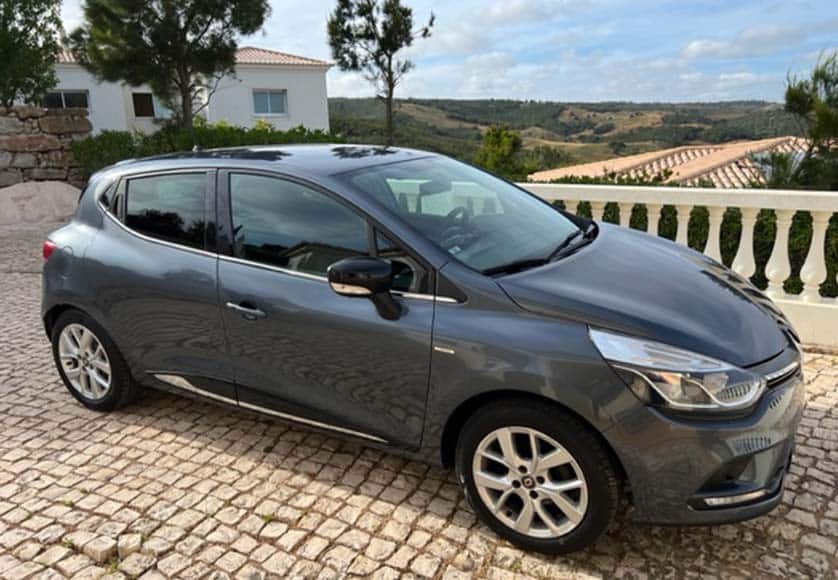 Here she is, the Clio Limited|A Lexus hard-top convertible, a favorite I owned in the USA|The Dodge Ram TRX - testosterone on wheels|With my boyfriend Glenn and Bernardo, our salesman at Cars and Cars in Faro.