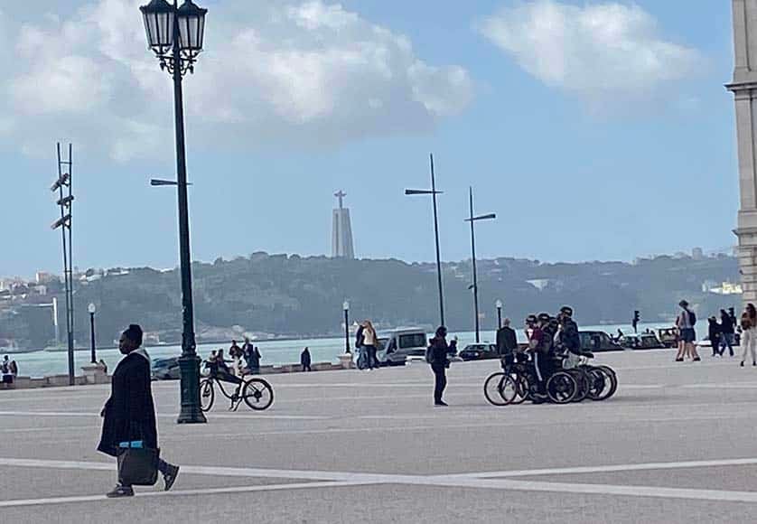 Looking from the Praça do Comércio across the Tagus towards the resplendent and enormous statue of Cristo Rei, opened in 1959
