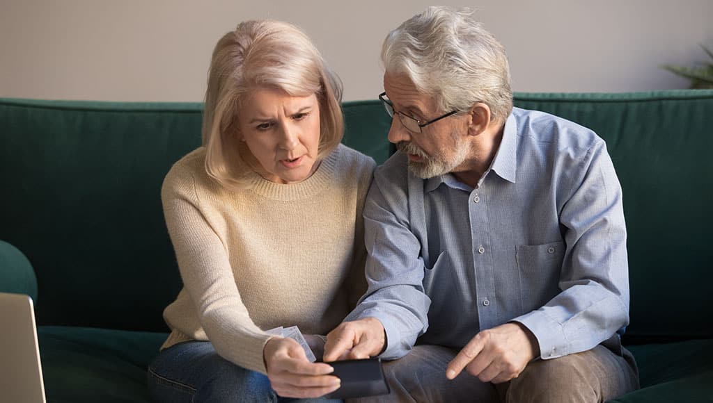Serious,Stressed,Senior,Old,Couple,Worried,About,Paperwork,Discuss,Unpaid|Lisbon,,Portugal.,17,January,2021.,Portuguese,Presidential,Elections,Early,Votes|Wealthy expats report highlights lack of awareness of future tax implications|Magnifying,Glass,Over,The,Word,Tax,On,Form,1040
