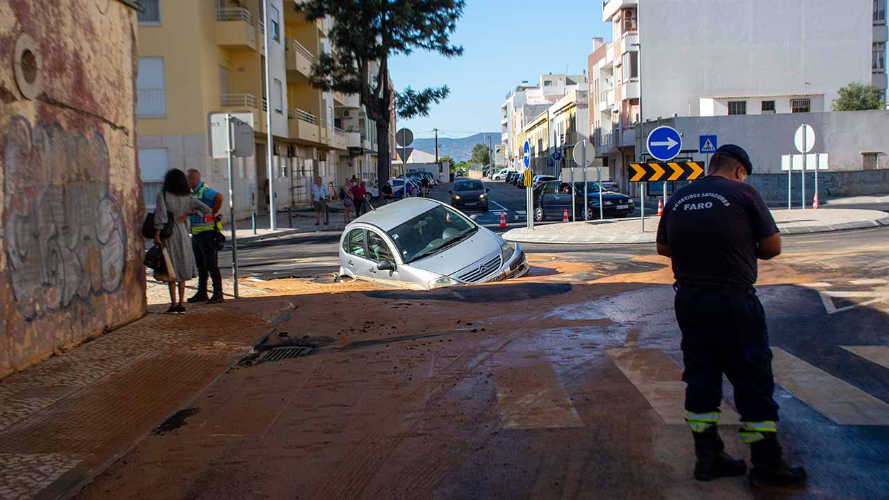 Newly built roundabout "swallows" car in Faro.|Newly built roundabout "swallows" car in Faro.|Newly built roundabout "swallows" car in Faro.