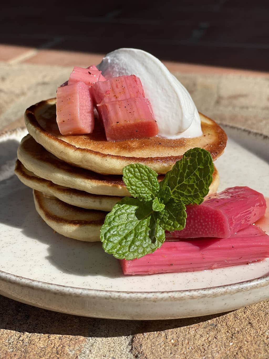 Pancakes with poached rhubarb|Rhubarb preparations for grappa panna cotta