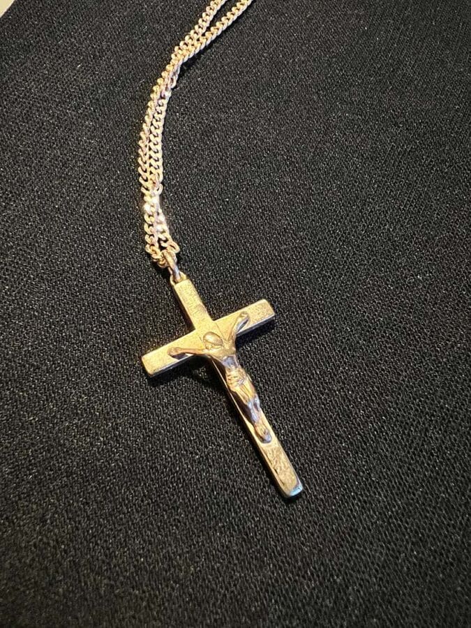 The crucifix pendant was given to Jacky Shell by his late mother 56 years ago