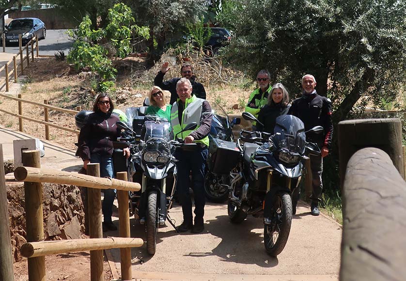 The international group of riders and pillions from the ASB in front of Ponte Internacional do Marco. From left: Ana, Jayne, Walter, Keith, Alfred, Carina and Thomas - Photo: Walter Kollert|The winding ascent towards the Salto de Saucelle in Salamanca Province, Spain. Photo: Carina Dürr|The stunning view from the Salto de Saucelle to the Douro valley that forms the border between Spain (left) and Portugal (right). Photo: Alfred Koolen