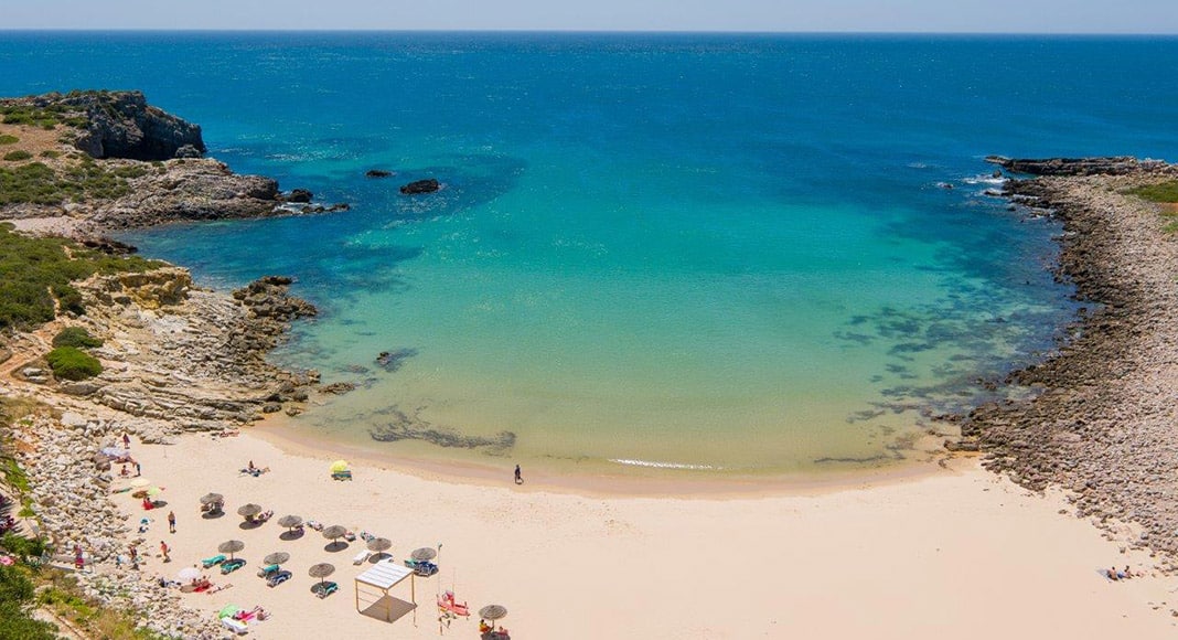 Praia da Ingrina, Vila do Bispo Photo: RTA|Blue Flag indicating a quality beach|Due to sea erosion, cliffs can be unstable - Vale Currais, Carvoeiro Photo: INÊS LOPES|Lifeguards with the red and yellow flag which shows where it's safest to swim|The beach weather is here - Carvoeiro beach Photo: Nuno de Santos Loureiro|The sand is very comfortable for walking - Alemão beach Photo: RTA|The west coast tends to be more hazardous due to the powerful Atlantic Ocean - Photo INÊS LOPES