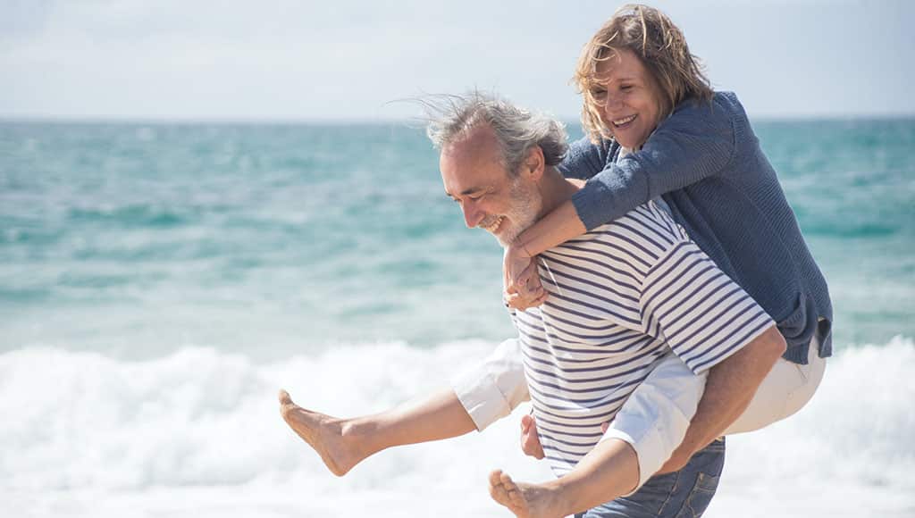 senior couple on the beach