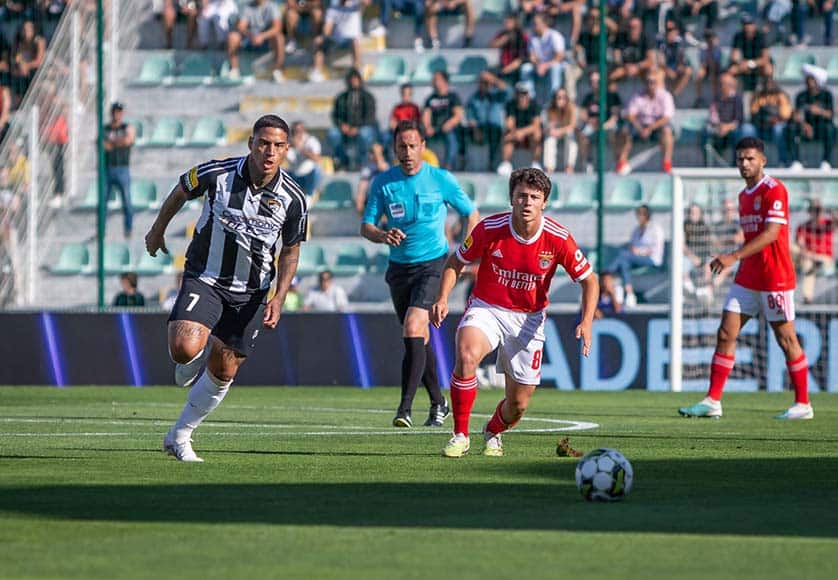 Portimonense midfielder Carlinhos (left) looks to gain possession of the ball as Benfica’s Algarvian stars João Neves (centre) and Gonçalo Ramos (right) helped their team put on a show in their home region|Portimonense vrs Benfica