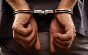 Man arrested for “beating and threatening to kill wife in front of children”