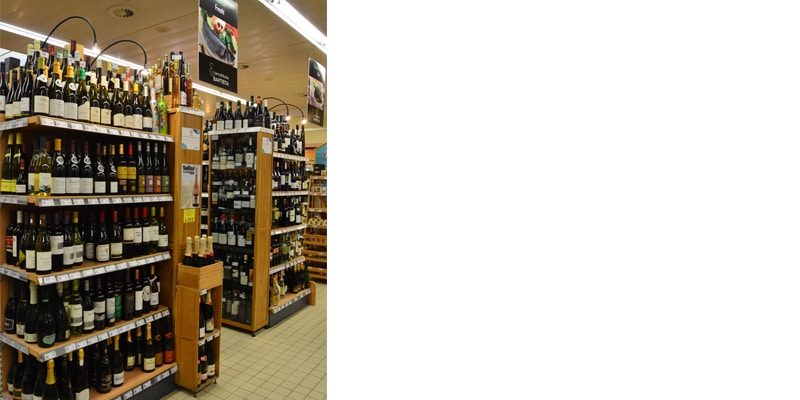 View of Baptista Supermarket wine offer that includes rosés, reds, whites, champagnes and spirits