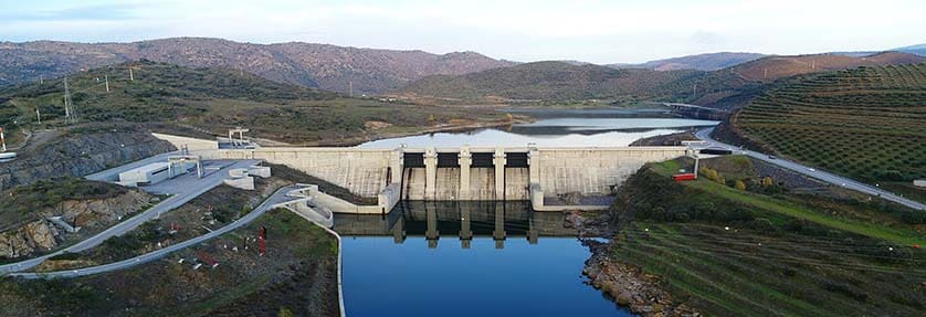 Aerial shot of the Baixo Sabor dam which is the 3rd largest reservoir in Portugal, with a maximum capacity of a billion cubic metres of water - a product farmers and producers in the area desperately need. Image: https://www.movhera.pt/en/barragem-de-baixo-sabor