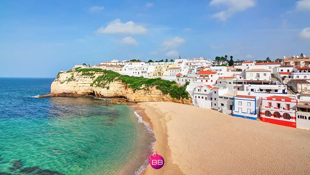 Photo of part of the coastline at the Algarve region where Blevins Franks has an office|A Blevins Franks desk at an one of their seminars.|Photo of the lounge and waiting are at Blevins Franks office in the Algarve