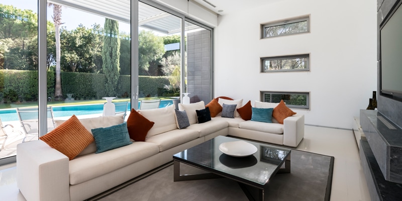 Living room of one of the properties in Celine Rodrigues' property management portfolio|Outside space of one of the properties in Celine Rodrigues' property management portfolio|Bedroom of one of the properties in Celine Rodrigues' property management portfolio