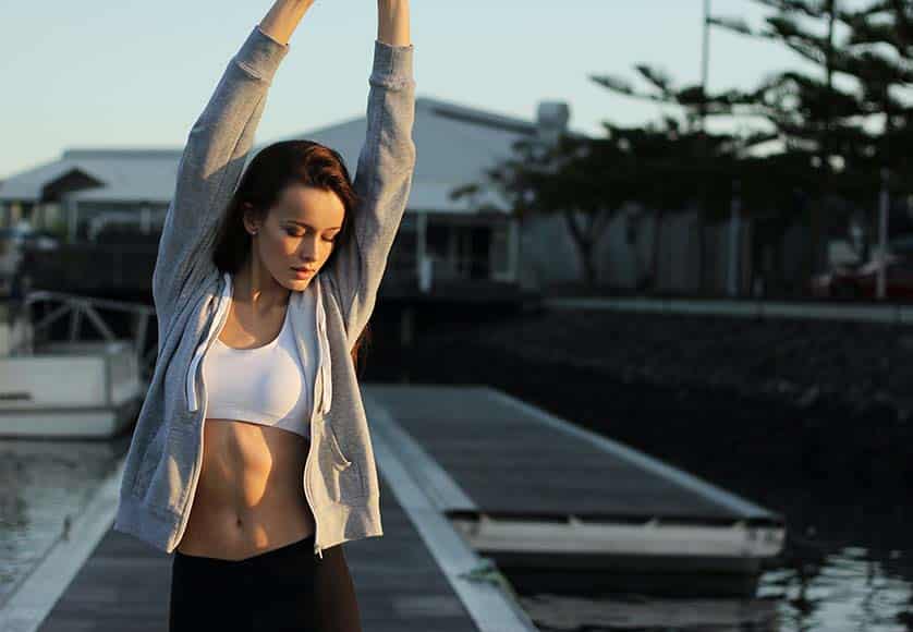 woman stretching arms