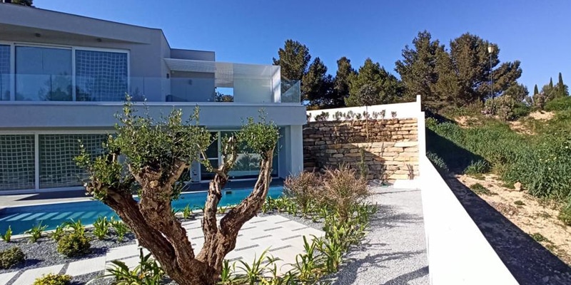 Part of the facade of an energy-efficient house built by CORE Architects in the Algarve