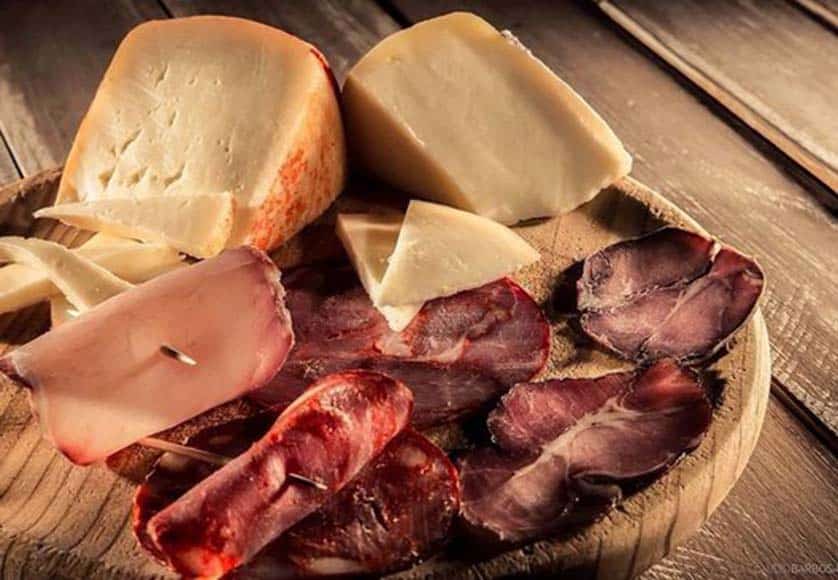 Cheese wine and smoked sausages