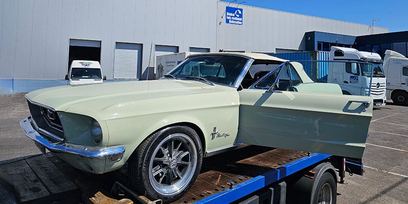 Photo of a vehicle being transported for import