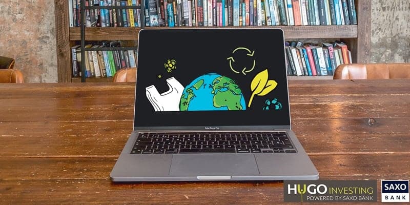laptop with image of the earth plastic bag and recycle symbol referring to sustainable investments that need to be made