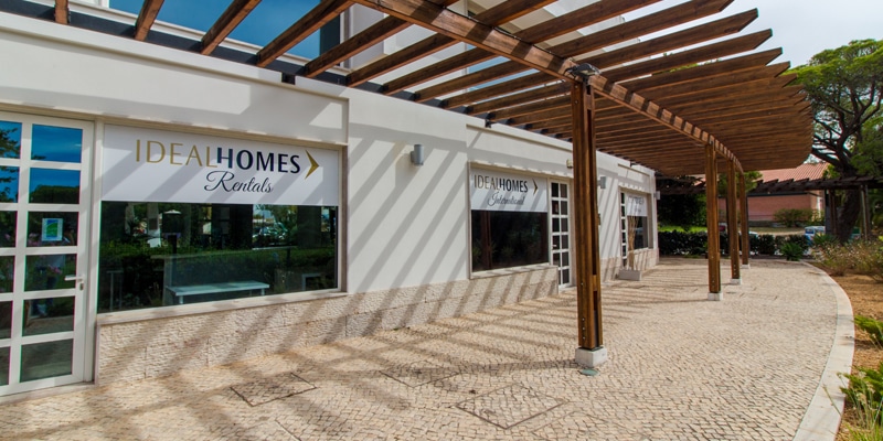 View of the outside of Ideal Homes International's office|View of the inside of Ideal Homes International's office|