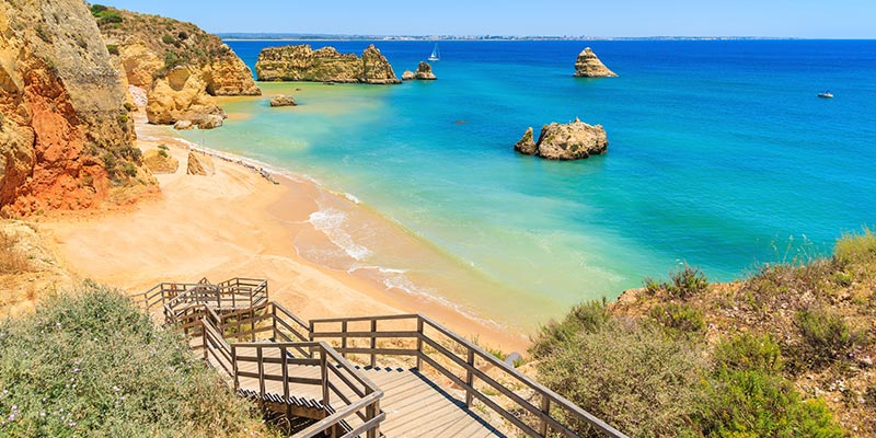 Partial image of a stariway leading down to a beach in Western Algarve||