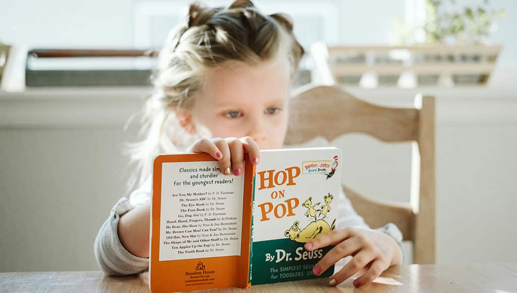 Child reading a book