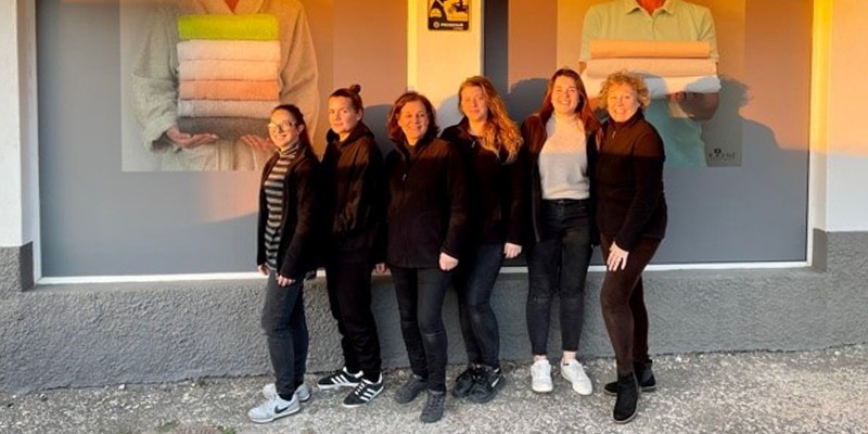 Photo of Linen-etc team outside one of their stores