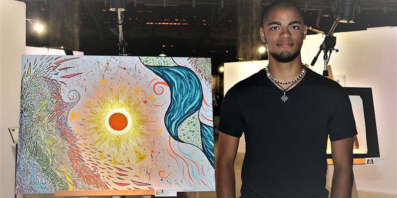 Lucas with his painting Without Mushrooms