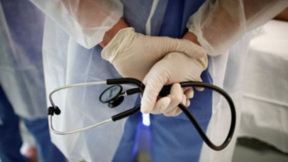 doctor holding stethoscope
